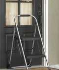 Two Step Big Step Stool Made Of Steel, Grab And Go Lightweight Gray, Non Marring Feet, Large Slip Resistant Step by door
