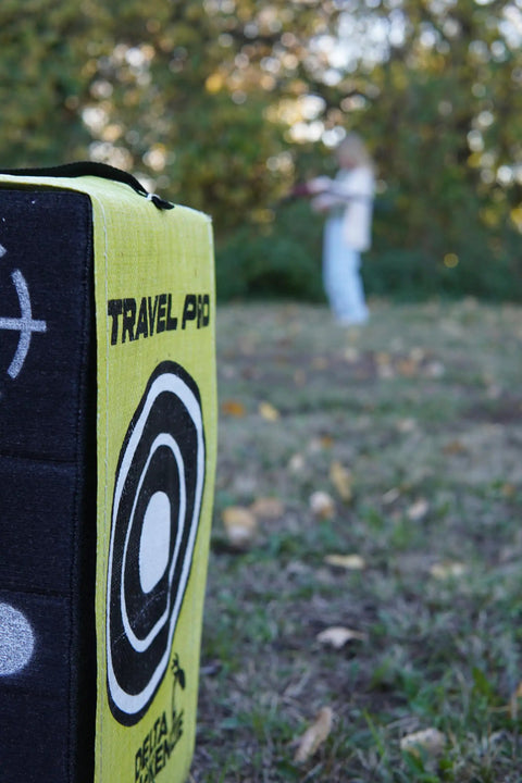 Travel Pro Portable Layered Foam Archery Target With Welded Core Technology for field and broadheads in grassy area