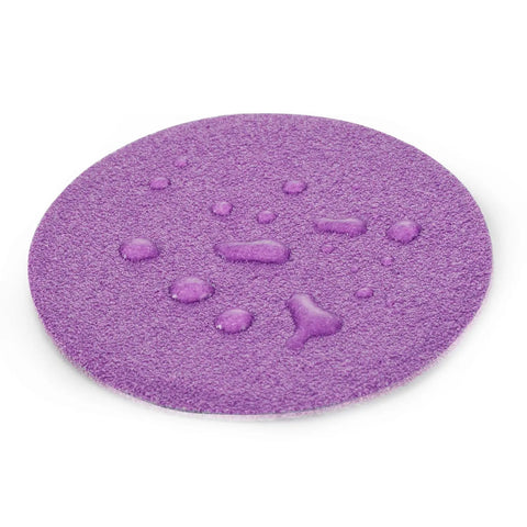 Close-up of a purple 3 Inch Sanding Discs Set, 40 Pack, 400 Grit Wet Dry Hook And Loop Discs For Random Orbital Sander with water droplets.