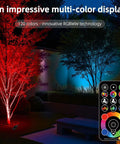Outdoor 50W RGBW LED Flood Light With Remote Control illuminating trees with 120 color modes, visible remote, vibrant yard display.