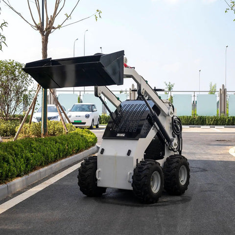 Compact Crawler Mini Skid Steer Loader With Deepened Bucket For Construction Barn Cleaning And Landscaping Stand On Skid Steer Loader With Reinforced Frame For Farm And Industrial Use Built Tough With Custom Upgrades And Easy Accessory Options on road