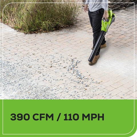 Person using 40V Cordless Walkway Warrior Yard Tool Combo Kit With 2.0Ah Battery And Charger Trimmer With 12 Inch Auto Feed Line And 390 CFM Leaf Blower to clear debris on pathway