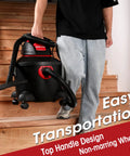 Person carrying Heavy-Duty 6 Gallon Wet Dry Vacuum With 3 Peak HP Power and Dual-Flex Hose down stairs with ease.