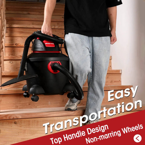 Person carrying Heavy-Duty 6 Gallon Wet Dry Vacuum With 3 Peak HP Power and Dual-Flex Hose down stairs with ease.
