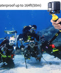 Diving group underwater with Rechargeable Underwater Video Light 450 Lumens For GoPro And Osmo Action Waterproof To 164 Feet