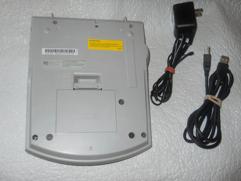 Back view of PTouch 2300 Labeling System No Fuss Stand Alone Label Maker With PC Compatibility next to power and USB cables.