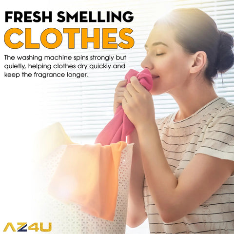 Woman enjoying fragrance of fresh clothes from washing machine