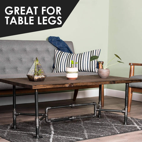 Black Steel Plumbing Pipe 3/4 Inch By 18 Inch Pre Cut 4 Pack used as table legs for industrial DIY furniture in living room.