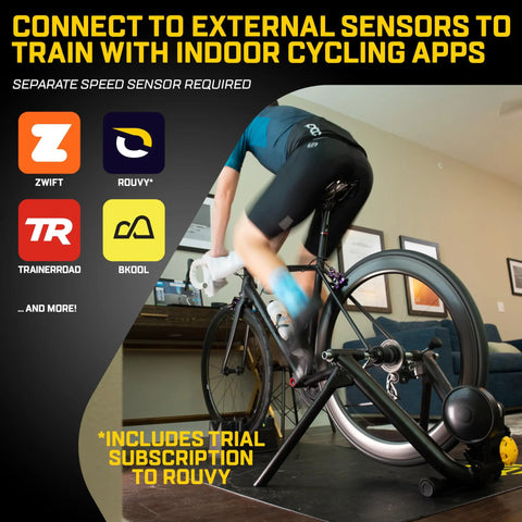 Cyclist using Magnetic Plus Indoor Bike Trainer With Wheel On Setup And Quiet Fluid Resistance for realistic rides at home.