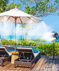 Outdoor Misting System For Patio And Yard With 59 Ft Line, Filter, 23 Brass Nozzles, Brass Adapter Three Quarter Inch, Leak Free Black PU Tubing, Rust Resistant, Great For Garden, Greenhouse, Trampoline, And Chicken Coop Cooling setup on poolside patio with chairs and umbrella