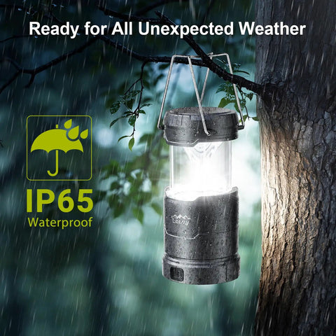 Ultra Bright LED Camping Lanterns 4 Pack For Power Outages With 3 Color Modes And Dimmable Battery Power hanging in rain on tree