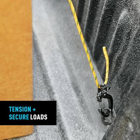 CamJam SlideLock Bungee Cord Tightener with Pull To Tighten Lock and Quick Release Lever securing a yellow cord on a truck bed