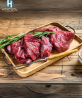 Oil Rubbed Black Utility Tray Pulls 10 Pack With Screws Durable Die Cast Hardware holding tray with raw meat and herbs on wooden table.