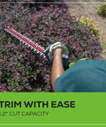 Person using 80V Brushless Hedge Trimmer With 26 Inch Dual Action Blades Long Reach Yard Tool Includes 2Ah Battery And 2A Charger