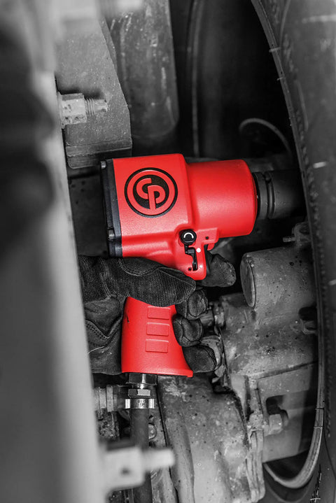 Super Tight 3/4 Inch Air Impact Wrench With Comfortable P Grip And Tease Trigger Control Delivering 1050 Foot Lbs Of Solid Power Inside A Featherweight Red Steel Housing Engineered To Shred Stubborn Fasteners Without Throwing A Fit