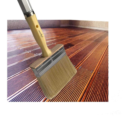 Deck Stain And Paint Brush 5 Inch Wide with threaded handle applying stain on wooden deck surface