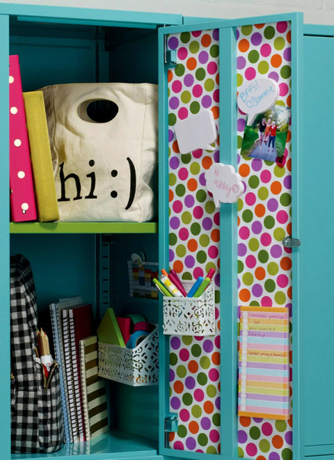 Polka dot decorated locker using Removable Poster Tape With Dispenser, Handy Three Quarters Inch Wide By 12.5 Feet Clear Double Sided Adhesive For Posters, Photos, Cards And More, Easy Detach On Most Surfaces Without Damage.