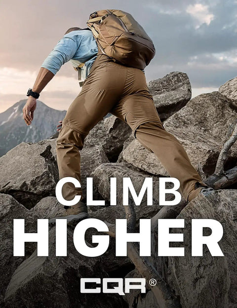 Back view of man climbing rocks wearing Mens Convertible Cargo Pants For Hiking And Work Water Resistant Zip Off Stretch Tactical Pants