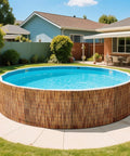 Natural Reed Fencing Roll For Balcony Patio Garden And Yard Privacy Screen Sixteen Point Four Feet Long Brown Eco Friendly Durable Easy To Install For Outdoor Use surrounding a round pool in a yard
