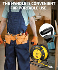 Worker holding 80 Foot Heavy Duty Retractable Extension Cord Reel For Indoor Outdoor Use With Four Grounded Outlets 14/3 AWG SJTW Cord 13 Amp Circuit Breaker Metal Stand ETL Listed