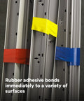 Colored vinyl floor marking tape on metal beams showcasing adhesive strength
