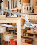3 Pack 18 Inch Deep C Clamps With Swivel Pads in use for woodworking on workshop table.