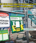 Upgraded Portable Eye Wash Station OSHA Approved Emergency Eye Wash Kit mounted on a fence with 2 empty bottles.