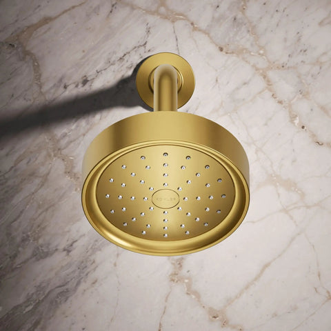 Purist Single Function Shower Head 1.75 GPM Vibrant Brushed Moderne Brass Finish mounted on marble wall