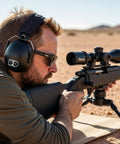 Man using Ultra Comfy 37 Db NRR Safety Ear Muffs For Shooting And Industry Work High Noise Reduction Earmuffs for shooting rifle