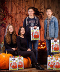 Teens holding Say Boo To Drugs Halloween Reflective Gift Bags 150 Pack for Trick Or Treat Parties Party Favors and decorations.