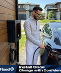 Man charging Tesla vehicle using Lockable Outdoor EV Charger Enclosure With Heavy Duty Metal Wall Case For Tesla Connector.