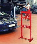 12 Ton Hydraulic Shop Press With Adjustable H-Frame in a garage next to cars, red heavy-duty, 24.8x15.35x51.4 inches