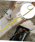 No Sweat Self Adhesive Measuring Ruler Tape 2 Pack For Industrial Workbenches And Cutting Tables Spot On Stick On Marking Strips For Real Deal Woodworking And Weekend Projects being used on a wooden plank.