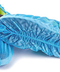 Heavy Duty Waterproof Disposable Shoe Covers With Elastic Band And Non Slip Silicone Sole For Floor Protection Blue XL 100 Pack Fits Men Size 11 And Women Size 13 For Home And Work, showing bottom view of shoe covers over a sneaker.