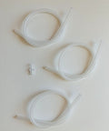 Premium Heavy Duty Milk Hose Tubes For Espresso Makers 3 Pack Drop In Replacement Tubing and secure nipple connectors on white background.