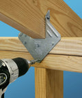 Installing heavy duty galvanized connector screws built dang tough for framing decks and ditches nails into timber joists.