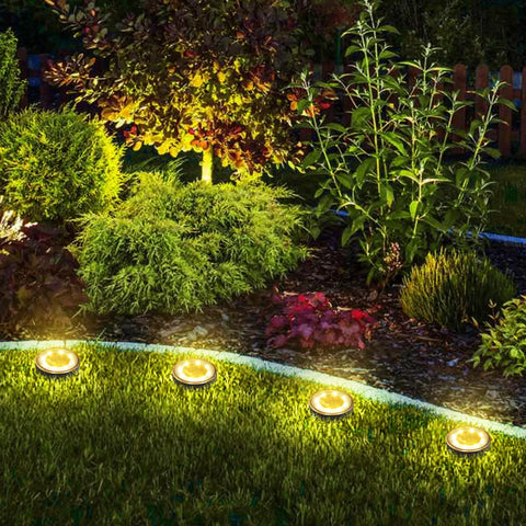 Garden with illuminated 12 Pack Solar Ground Lights With 8 LED Per Light Waterproof In Ground Outdoor Pathway Lighting Sensor Disk