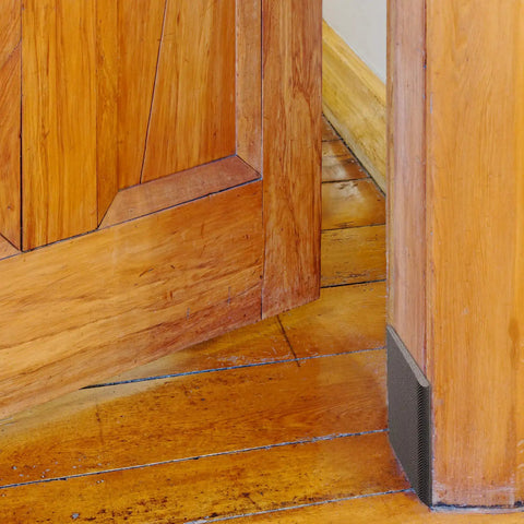 Six Pack Self-Adhesive Door Corner Seals, Gap Filler Seal Strips installed on wooden door frame for weather protection