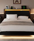 Sick Queen Floating Bed Frame With LED Lights And DC Charging Ports, Hidden Toe Guard Base, Built In Storage Headboard, Silent Noise Free Platform Sleeper, Quick Setup For Chill Bedroom Vibes, Matte Black, with illuminated headboard.