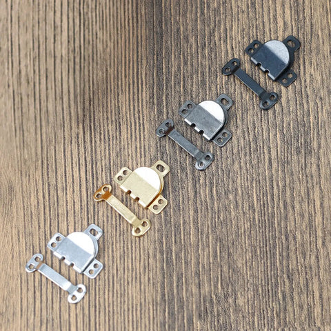 Sixty Pairs Of High Grade Sewing Hooks And Eyes Garment Fasteners Delivering A Slick Fit For Every Wardrobe Skirt Dress Bras Plus Crafting Projects Knockout Durability Zero Hassle Clasp Totally Rust Proof Heavy Duty 16Mm Hardware assorted metal hooks in silver, gold, black, gunmetal.
