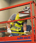 Worker using adjustable non-shock absorbing lanyard 4 to 6 feet yellow for fall protection at height on lift platform