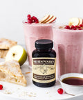 Madagascar Bourbon Pure Vanilla Bean Paste For Baking And Cooking, bottle with fruit smoothies and pie, 1 gallon.