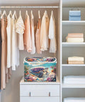 Kick Some Clutter With These Heavy Duty Foldable Storage Bins, Featuring Snug Click Lids And Super Sturdy Handles, Plus Collapsible Oxford Basket Organizers For Real Closet Solutions in a closet with hanging dresses.