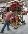 Worker using Heavy Duty Machinery Mover Dolly 26,400-Lb Capacity With 8 Rollers Equipment Skates in factory