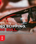 ANSI Z87.1 Clear Safety Glasses With Side Shields For Men And Women on a table, emphasizing secure fit with branding visible.