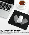 Stitched Edge Non Slip Rubber Mouse Pad For Laptop And PC Use Go To Desk Mat For Gaming Office And Home Black Square 9.8 Inches By 8.3 Inches By 0.08 Inches shown on a desk with a laptop and cup of tea.
