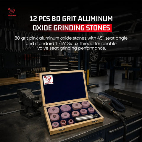 Open box of 12 pink 80 grit aluminum oxide stones for valve seat grinding, displayed in workshop setting.