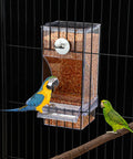No Sweat Bird Feeder And Water Dispenser Set For Parrot Cages with seed pot, two birds, and clear acrylic design.
