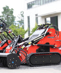 Stomp Mini Skid Steer Loader 1800lbs Compact Machine in a garden setting, ideal for digging and light construction projects