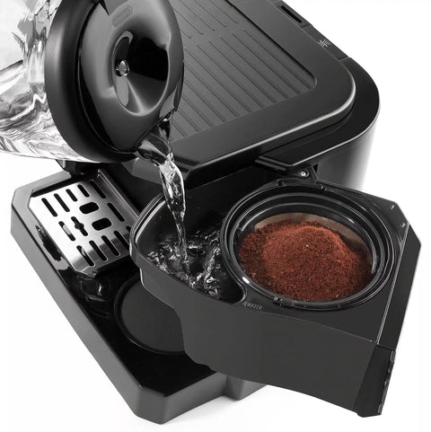 All In One Coffee And Espresso Machine With 47 Ounce Capacity For Home Barista Style Brews water tank being filled